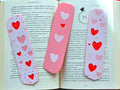 Pink Heart Bookmark Collection Valentines Day Gift Set Reader Accessory Package Book Lover Present Three Piece Collection Embossed Heart Design Premium Quality Construction Beautiful Pink Shades Perfect Reading Gift Valentine Book Essential